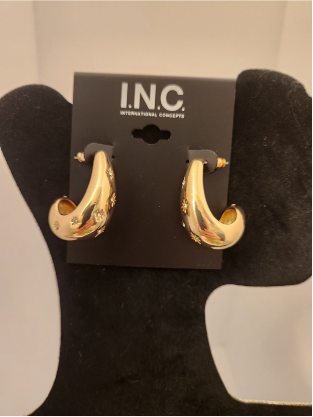 INC International Concepts Shiny Gold Curved Hoop Earrings with Floral Motifs